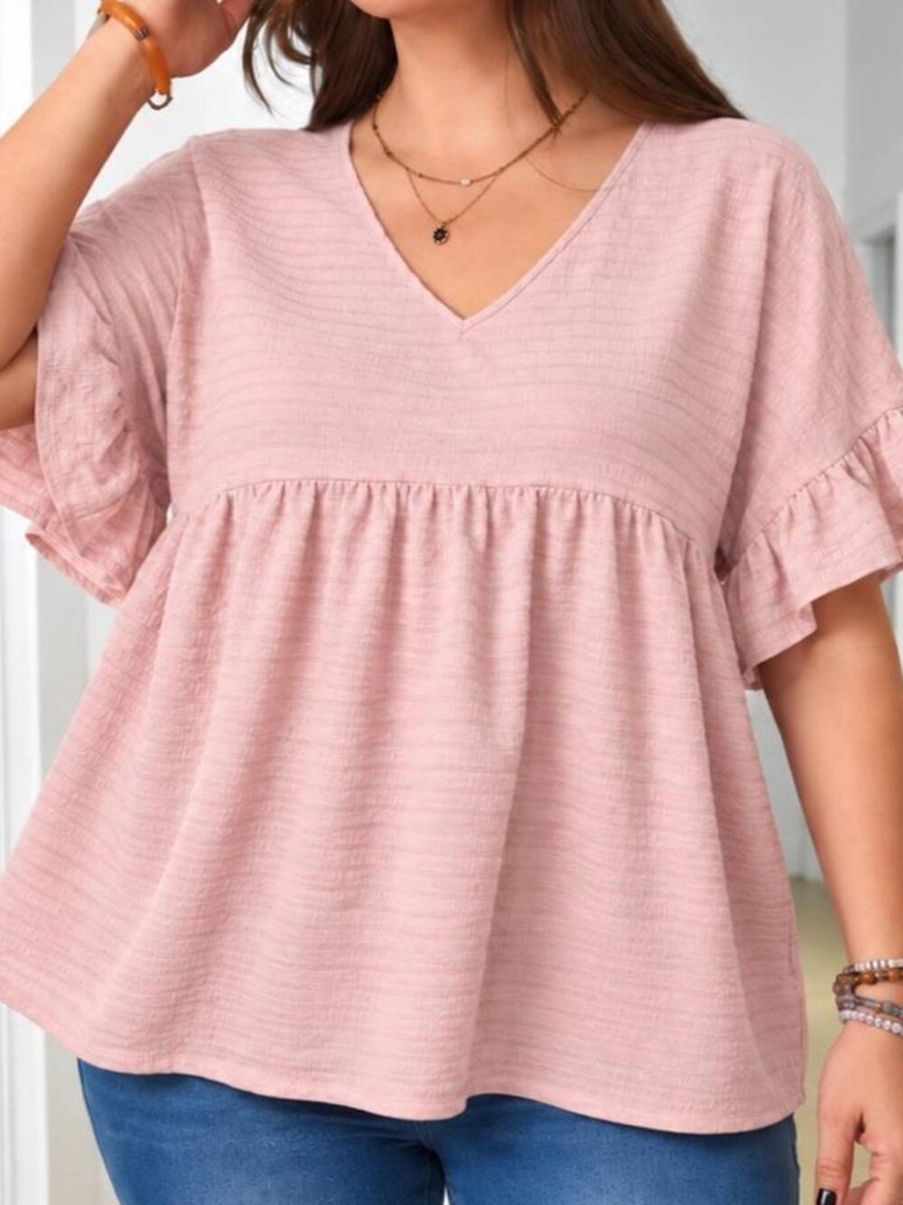 Babydoll blouse with ruffle sleeves